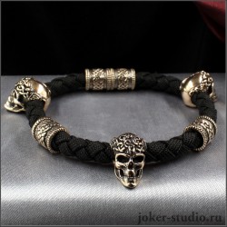 МУЖСКОЙ БРАСЛЕТ С ЧЕРЕПОМ И КЕЛЬТСКИМИ ШАРМАМИ НА ЧЕРНОМ ШНУРЕ ИЗ ПАРАКОРДА - КОНХОБАР